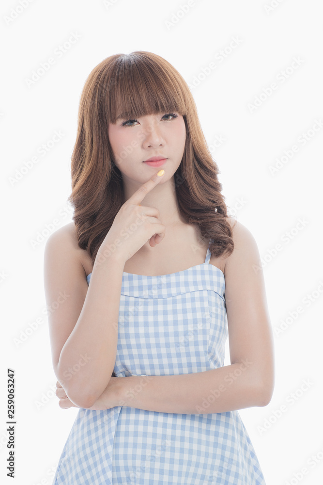 Front view close-up portrait of young beautiful Asian woman with curly long dark brown hair in light blue checked dress stand up straight isolated white background Front view close-up portrait of young beautiful Asian woman with curly long dark brown hair in light blue checked dress stand up straight isolated white background