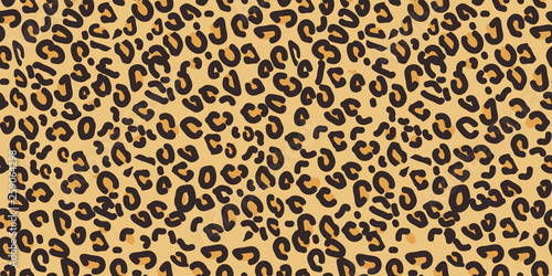 Leopard pattern. Seamless vector print. Realistic animal texture. Black and yellow spots on a beige background. Abstract repeating pattern - leopard skin imitation can be painted on clothes or fabric.