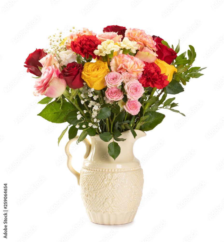 Beautiful roses in a vase isolated on white
