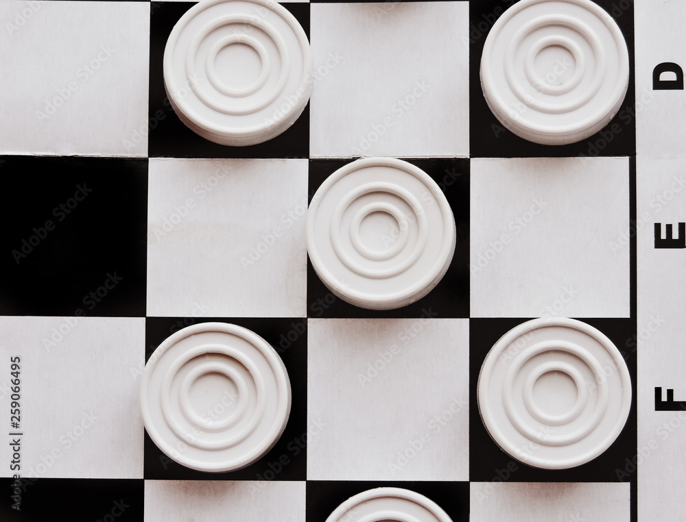 Checkerboard with checkers. Business strategy competition, strategic planning for winning