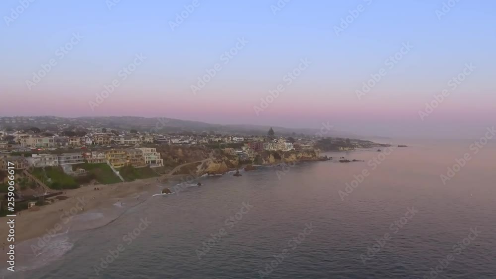 Sunset Aerial shot of ocean and homes in Newport Beach, CA Sunset Aerial shot of ocean and homes in Newport Beach, CA