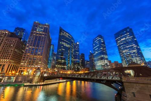 Night view of Chicago city and bridges cross river in Chicago, Illinois