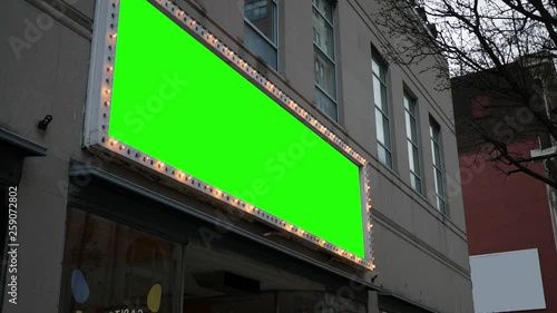 Green screen light up sign over business