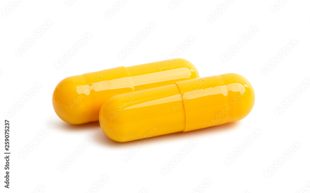 yellow capsules isolated yellow capsules isolated