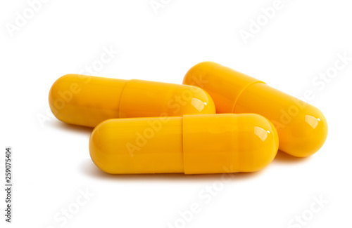 yellow capsules isolated