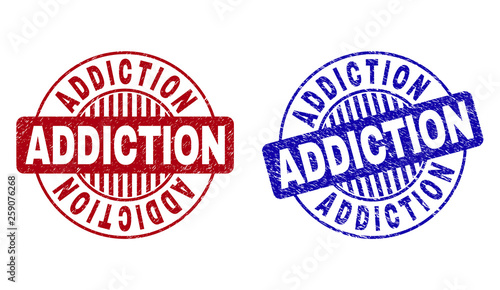 Grunge ADDICTION round stamp seals isolated on a white background. Round seals with grunge texture in red and blue colors. Vector rubber overlay of ADDICTION title inside circle form with stripes.