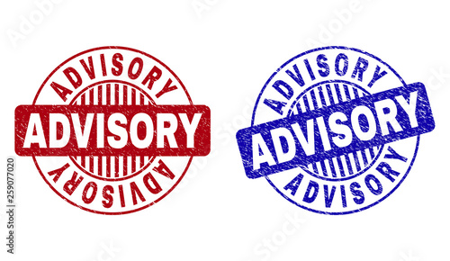 Grunge ADVISORY round stamp seals isolated on a white background. Round seals with grunge texture in red and blue colors. Vector rubber imprint of ADVISORY caption inside circle form with stripes.