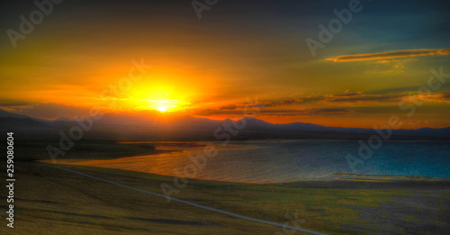 Panorama of Song Kul lake at the sunset, Kyrgyzstan © homocosmicos