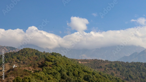 Clouds over Mountains, Landscape in the mountains, View from the Indrunag, Dharmashala, Himachal Pradesh, India.