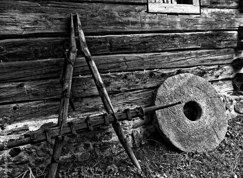 old cottage hut millstone black and white