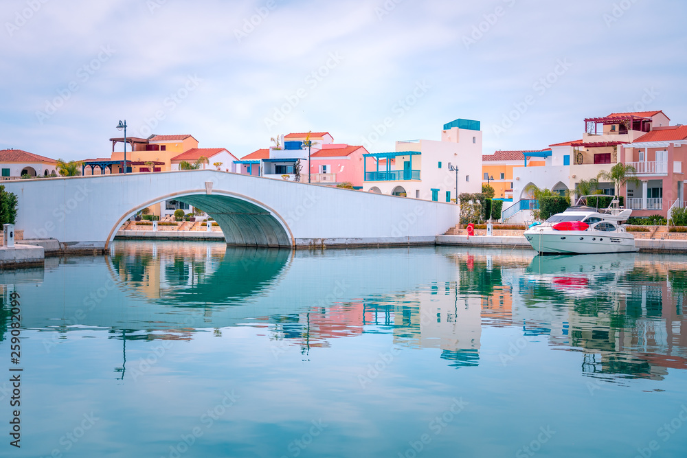 Beautiful view of Marina, Limassol city Cyprus. Modern, luxury life in newly developed port with yachts, restaurants, shops and waterfront promenade.