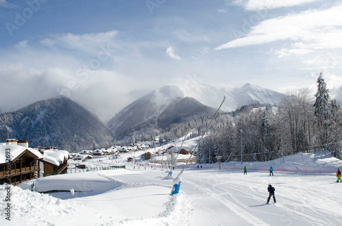Scenic view of mountains slopes and apartments at ski resort Laura Russia © Svetlana