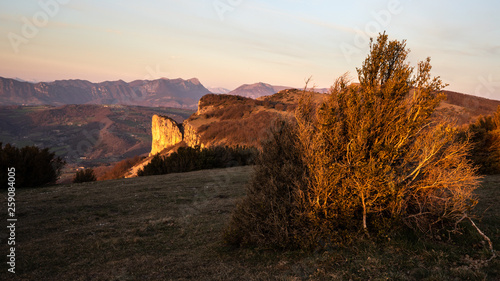 Hiking at sunset in french Alps