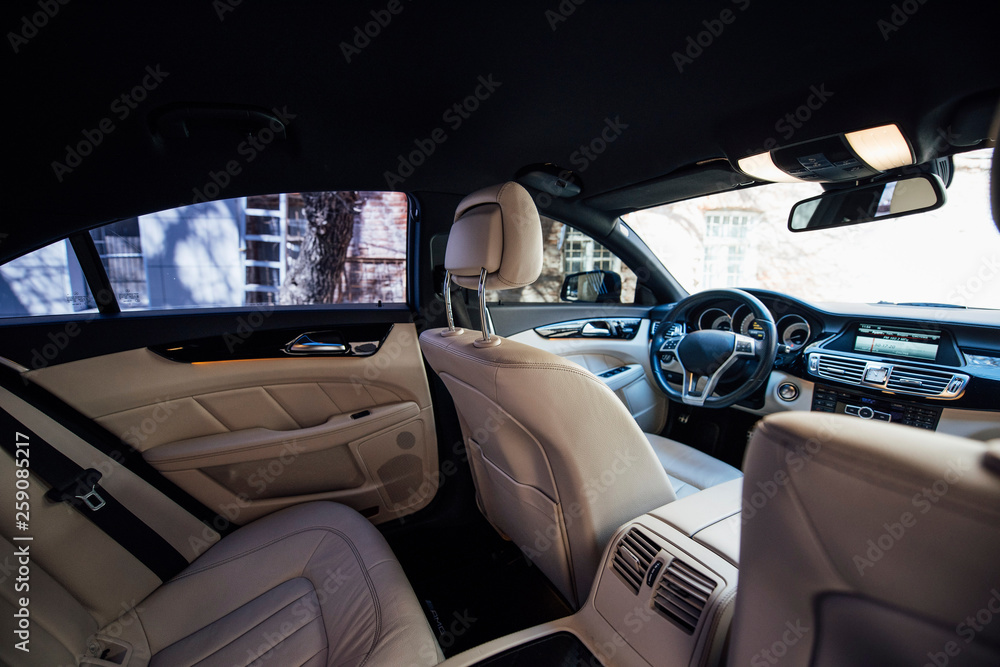 Inside the car with white leather seats Inside the car with white leather seats
