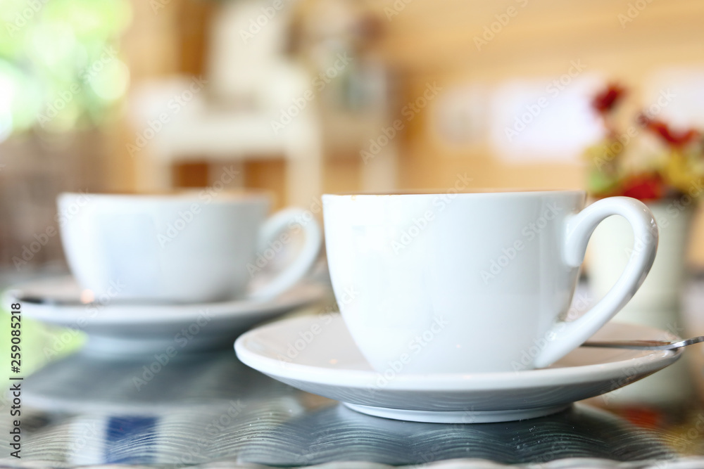 white cup of hot coffee drink put on table in cafe restaurant white cup of hot coffee drink put on table in cafe restaurant