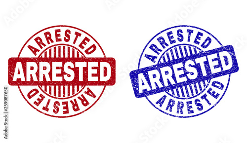 Grunge ARRESTED round stamp seals isolated on a white background. Round seals with grunge texture in red and blue colors. Vector rubber watermark of ARRESTED caption inside circle form with stripes.