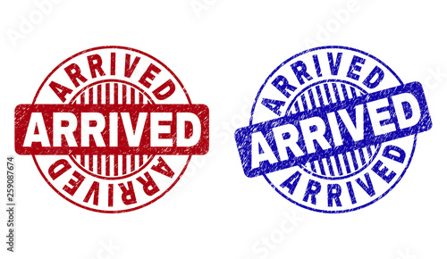 Grunge ARRIVED round stamp seals isolated on a white background. Round seals with grunge texture in red and blue colors. Vector rubber imprint of ARRIVED caption inside circle form with stripes.