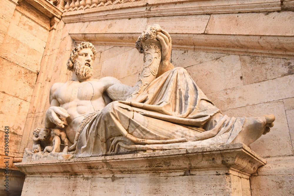 The ancient Roman statue of river god, as allegory of the Tiber River on the Capitoline Hill (Campidoglio) in Rome.  