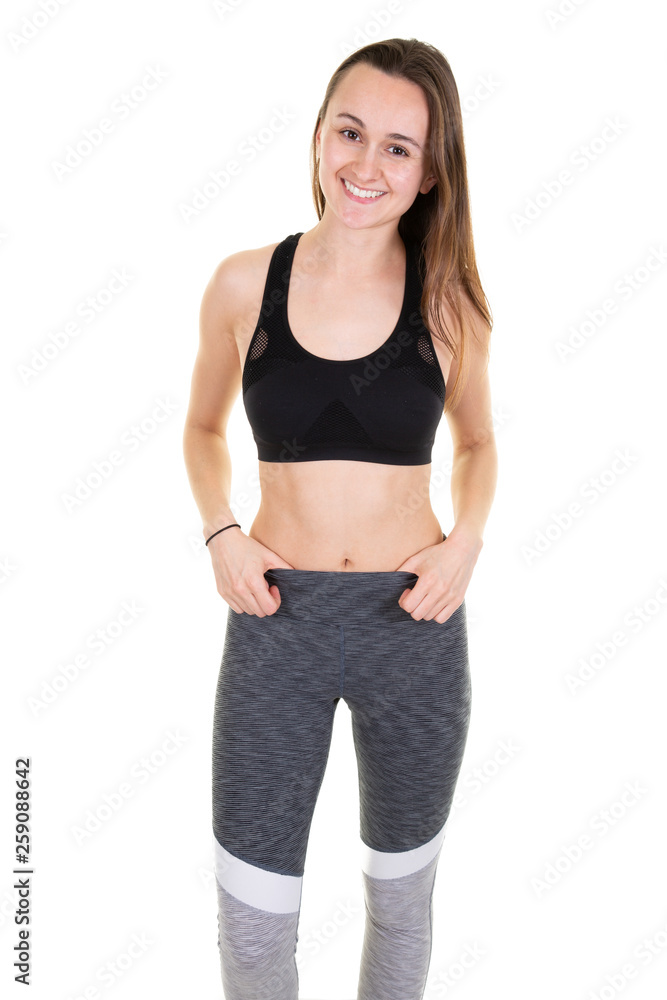 beautiful strong happy cheerful young sports woman posing isolated on white background beautiful strong happy cheerful young sports woman posing isolated on white background