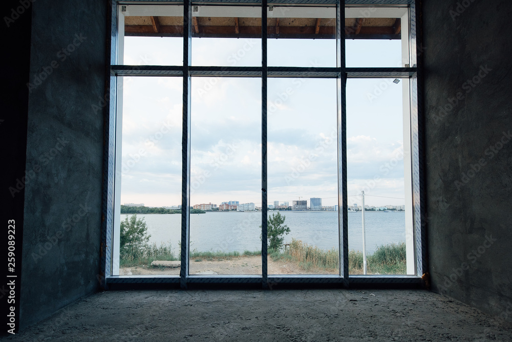 Fototapeta premium House without interior decoration. Repair, decoration works