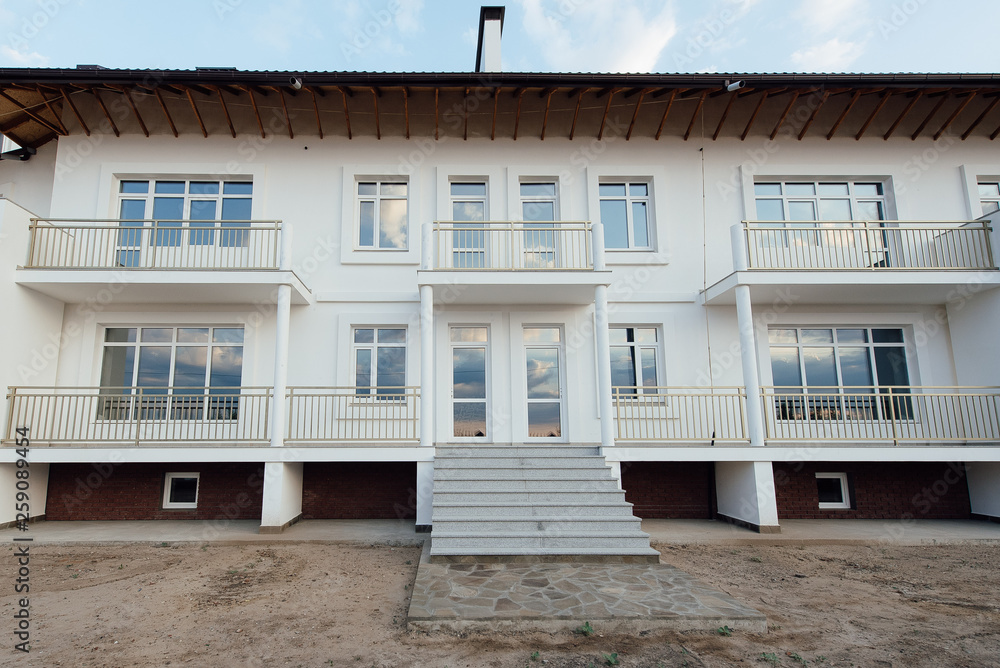Large two-storey white country house Large two-storey white country house