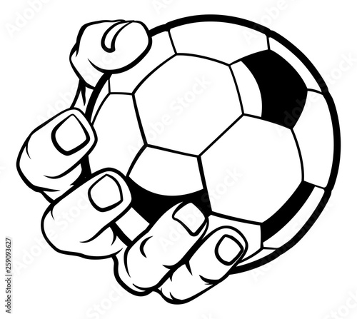 A strong hand holding a soccer football ball. Sports graphic