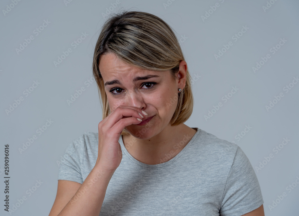 Portrait of sad and and desolated woman feeling hopeless Human expressions and emotions Portrait of sad and and desolated woman feeling hopeless Human expressions and emotions
