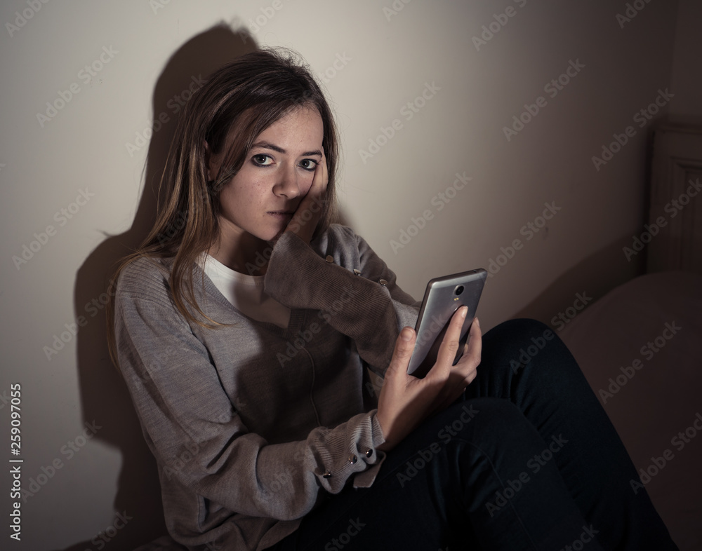 Depressed child victim of the dangers of internet and smart phone addiction. Depressed child victim of the dangers of internet and smart phone addiction.