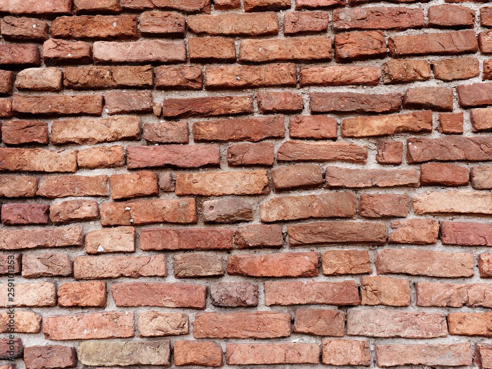 the old wall of red brick destroyed by wind and water the old wall of red brick destroyed by wind and water