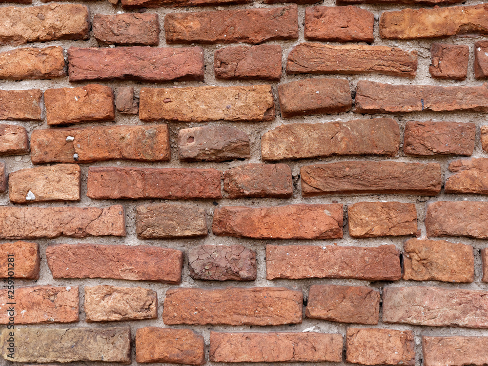 the old wall of red brick destroyed by wind and water the old wall of red brick destroyed by wind and water