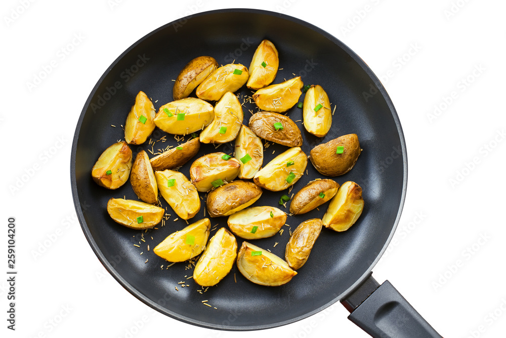 Fresh fried potato wedges with rosemary and spring onion on a pan, isolatedon white background, top view close-up shot Fresh fried potato wedges with rosemary and spring onion on a pan, isolatedon white background, top view close-up shot
