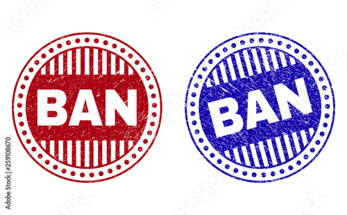 Grunge BAN round stamp seals isolated on a white background. Round seals with grunge texture in red and blue colors. Vector rubber overlay of BAN title inside circle form with stripes.