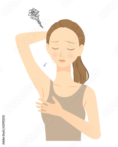 脇を気にする女性