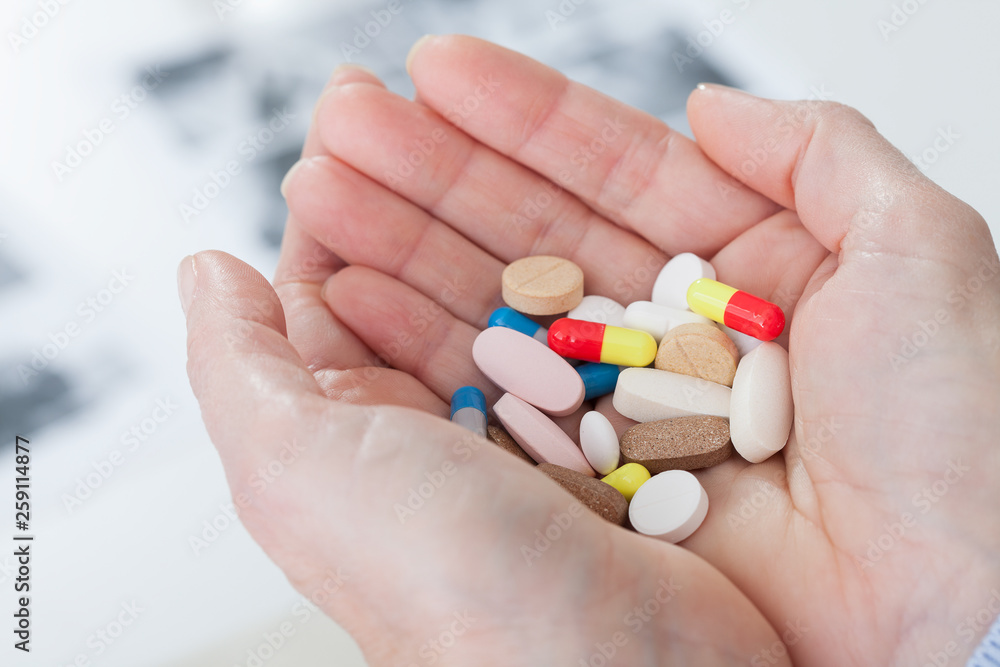 Pills on female hands cloce up. Suicide concept Pills on female hands cloce up. Suicide concept