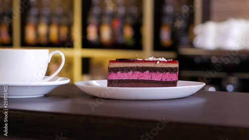 Piece of chocolate mousse cake with a cup of coffee. photo