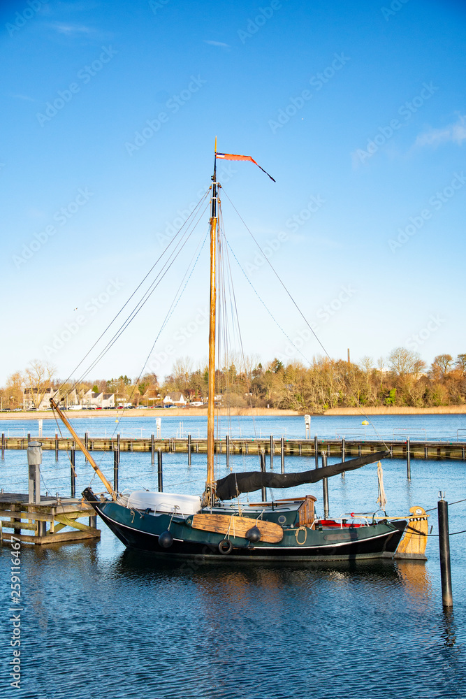 flat bottomed sailing boat with sideswords flat bottomed sailing boat with sideswords