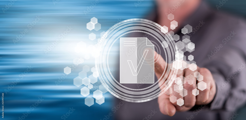 Obraz premium Man touching a document validation concept