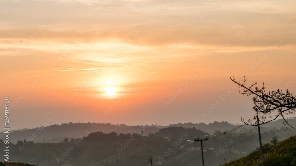 Golden sky with sea of mist in the morning and layer of mountain scene 