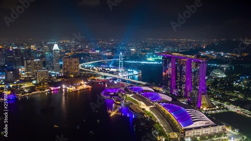 Wallpaper Mural night time illuminated singapore city flight over famous hotel bay aerial panorama 4k timelapse Torontodigital.ca