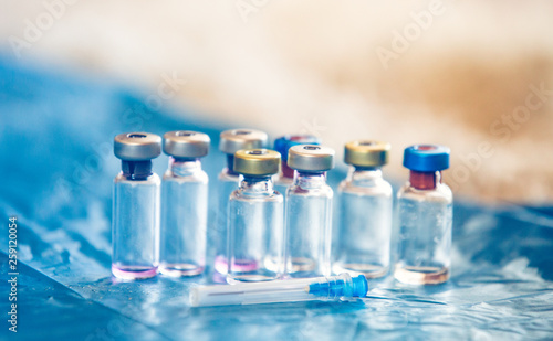 Infant and Childhood Vaccines bottles. Vaccines   Immunization concept