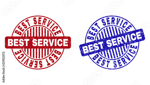 Grunge BEST SERVICE round stamp seals isolated on a white background. Round seals with distress texture in red and blue colors.