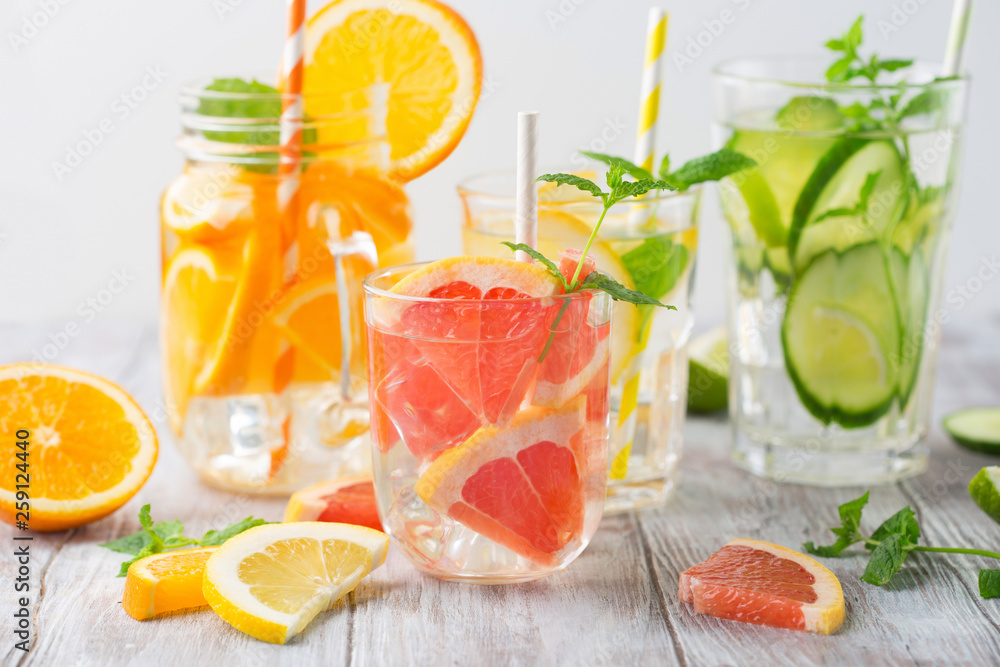 Infused water with fresh citrus fruits and ice Infused water with fresh citrus fruits and ice