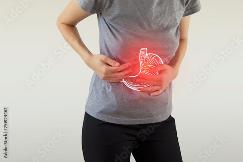 Digital composite of highlighted stomach of woman photo