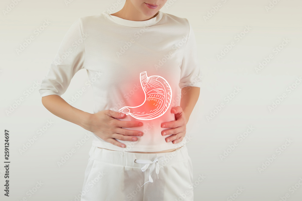 Digital composite of highlighted stomach of woman - obrazy, fototapety, plakaty 