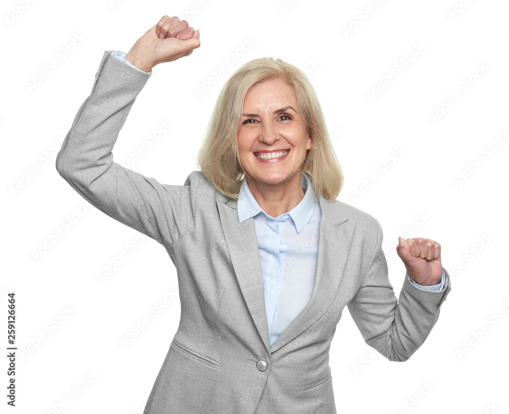 Obraz premium Cheerful senior business woman standing over white studio wall