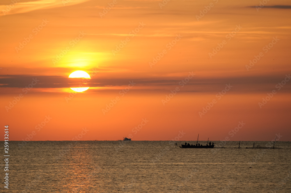 Fishing farm silhouette at sunrise