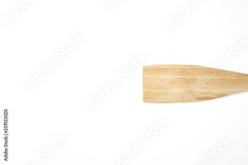 Pasta in wooden spoon on white background