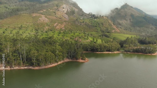 Aerial view beautiful nature with mountains and hills by Lake Mattupetty. Kerala State. Near the city of Munar. photo