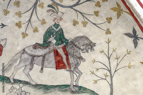 Billede på lærred A medieval depiction of a noble young falconer on his horse showing off the latest fashion of the 1400's