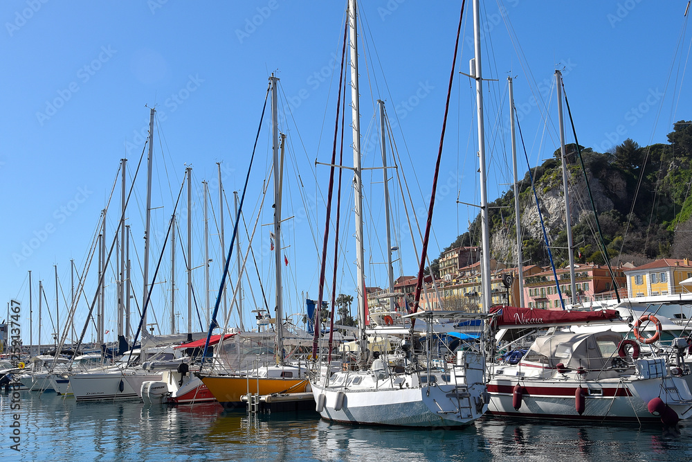 boats and white yachts in the sea port of Nice, French riviera